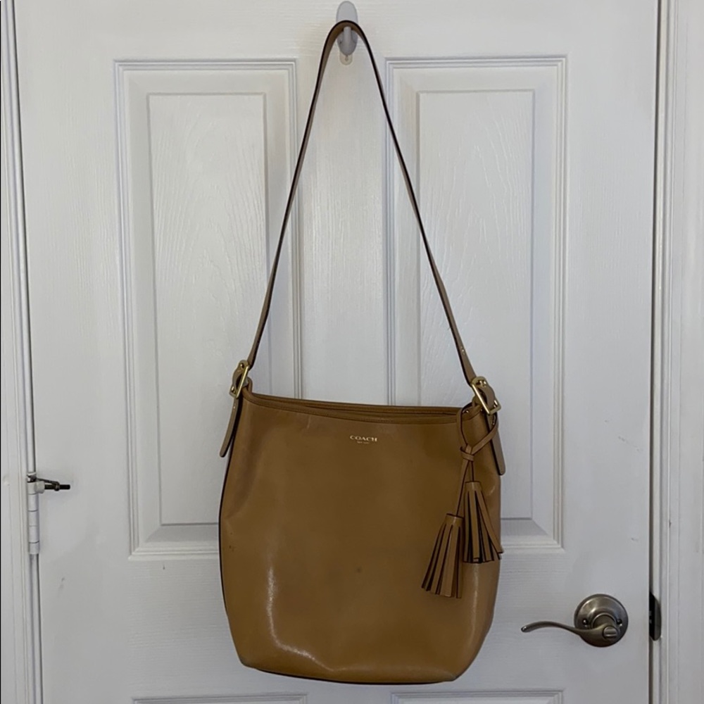 Coach cross body tassel bag